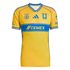 Tigres UANL yellow home jersey with a blue chest band featuring the CEMEX logo, blue Adidas logo, and club crests. The jersey has a blue V-neck and sleeve trim.