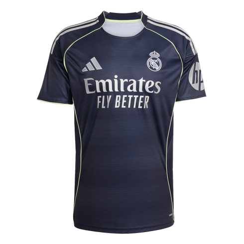 A navy Real Madrid soccer jersey with white Adidas and club logos, "Emirates FLY BETTER" sponsor, and lime green piping accents.