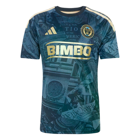 Navy and gold Philadelphia Union soccer jersey featuring a graphic print of historical Philadelphia landmarks and documents, including Independence Hall and the Constitution.