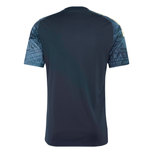 Back of a navy blue jersey with light blue sleeves featuring a printed pattern of text from the U.S. Constitution and Declaration of Independence.