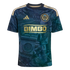 A dark navy and teal Philadelphia Union soccer jersey with gold accents, featuring a graphic print of historical Philadelphia documents like the Declaration of Independence.
