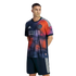 Man modeling a Houston Dynamo FC soccer kit with a navy, orange, and purple abstract patterned jersey and matching navy shorts, against a black background.