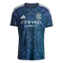 Navy and teal New York City FC soccer jersey with an intricate geometric pattern, silver club crest, white Adidas logo, and Etihad Airways sponsor logo.