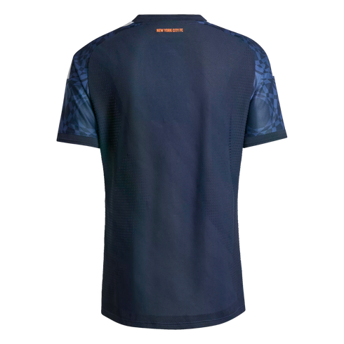 Back view of a navy blue New York City FC soccer jersey featuring orange 'NEW YORK CITY FC' text and geometric-patterned sleeves against a black background.