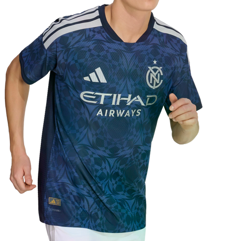 A person wearing a blue NYCFC soccer jersey with a geometric pattern, white shoulder stripes, and the Etihad Airways sponsor logo.