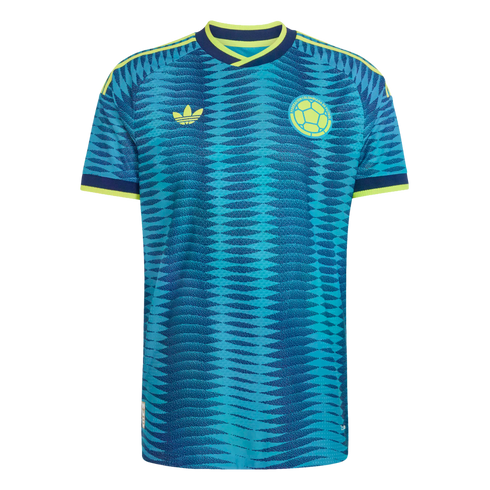 Teal and navy patterned Colombia soccer jersey with yellow trim, featuring the Adidas trefoil logo and team crest on the chest.