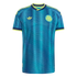 Teal and navy patterned Colombia soccer jersey with yellow trim, featuring the Adidas trefoil logo and team crest on the chest.