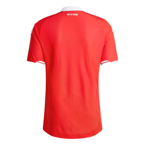 Back view of a red short-sleeve jersey with white collar and sleeve trim. Small white text near the neck reads "RED 'TIL THE END." Black background.
