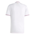 Back of a white short-sleeved jersey with red and blue trim on the collar and cuffs. A small gold "75 Ans" logo is on the back neck. The fabric features subtle vertical pinstripes.