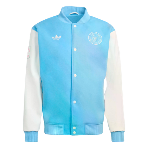 Light blue and white Adidas Inter Miami CF varsity jacket with a trefoil logo, team crest, white sleeves, and snap-button front.