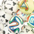 A pile of various Adidas soccer balls with different designs and patterns, including some from past World Cup tournaments.