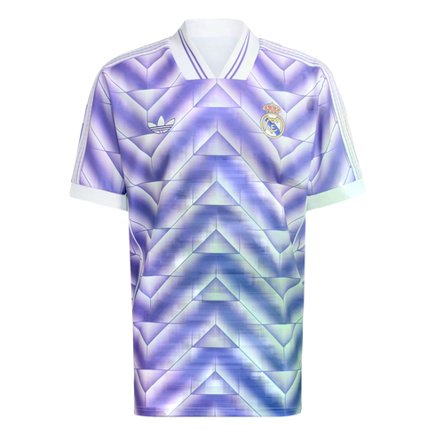 A purple Real Madrid Adidas jersey with a 3D geometric chevron pattern. Features white collar and cuffs, the club crest, and the trefoil logo.