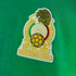 Embroidered crest of the Mexican national football team on a green jersey.