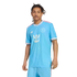A man with dreadlocks models a light blue Inter Miami CF soccer jersey with pink trim and a Royal Caribbean logo against a white background.