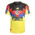 Club América soccer jersey by Adidas. It's yellow with a black upper section, red and blue geometric patterns across the chest, and sponsor logos including Caliente.