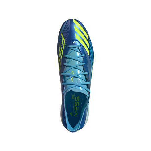 Top-down view of a blue Adidas F50 soccer cleat with bright yellow stripes and "MESSI" printed on the light blue insole.