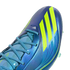 Close-up of a metallic blue Adidas soccer cleat with vibrant yellow stripes, light blue laces, and Messi branding.