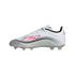 Side view of a white and silver Adidas F50 soccer cleat with pink accents and black curved lines.