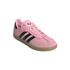 Pink Adidas Messi Samba sneaker with black stripes and a gum sole.