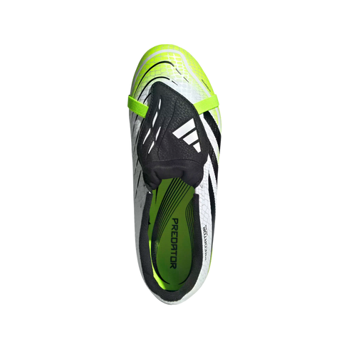 Top-down view of a white, black, and neon yellow Adidas Predator soccer boot with a fold-over tongue, set against a solid black background.