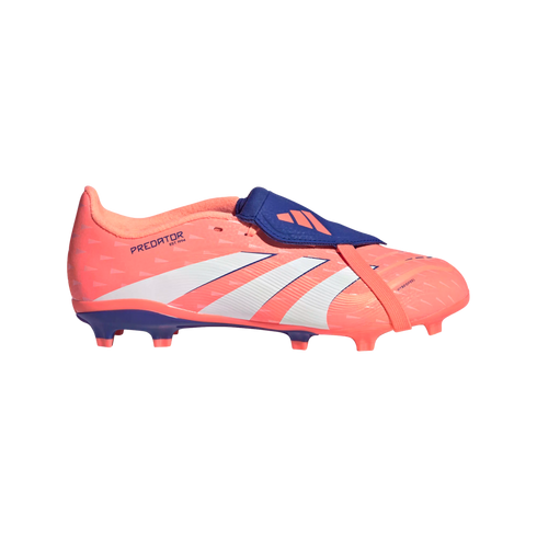 A coral-colored Adidas Predator football boot with a blue fold-over tongue, white diagonal stripes, and firm ground studs on the sole.