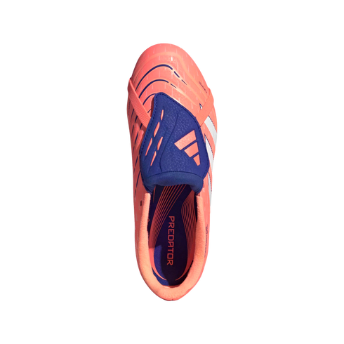 Top-down view of a coral Adidas Predator soccer cleat with a blue fold-over tongue and white stripes against a black background.