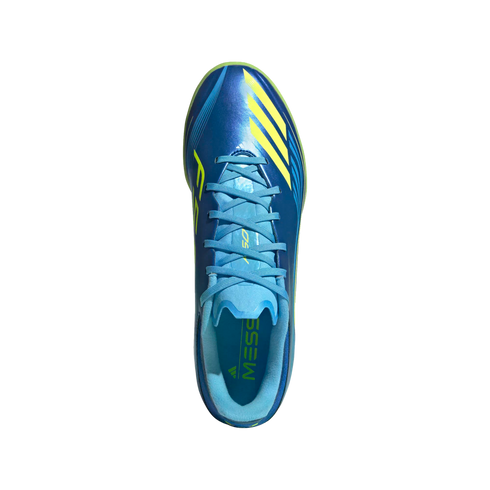 Top-down view of a metallic blue Adidas soccer cleat with neon yellow stripes and light blue laces, featuring "MESSI" printed on the interior heel.