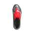 Top-down view of a grey Adidas Predator soccer cleat featuring a prominent red fold-over tongue with white stripes and an elastic strap over the laces.