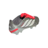 A metallic gray Adidas Predator soccer cleat with three white stripes and a red fold-over tongue, isolated on a black background.