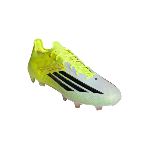 An Adidas F50 soccer cleat in neon yellow and white with black stripes, isolated on a solid black background.