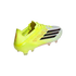 Neon yellow and white Adidas F50 soccer cleat with three black stripes and red accents on a black background.