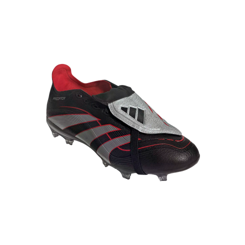 Side view of a black Adidas Predator soccer cleat with silver and red accents, featuring a fold-over tongue and an elastic strap against a black background.