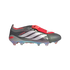 Adidas Predator soccer cleat in metallic grey with silver stripes, a red fold-over tongue secured by a black strap, and an iridescent soleplate.