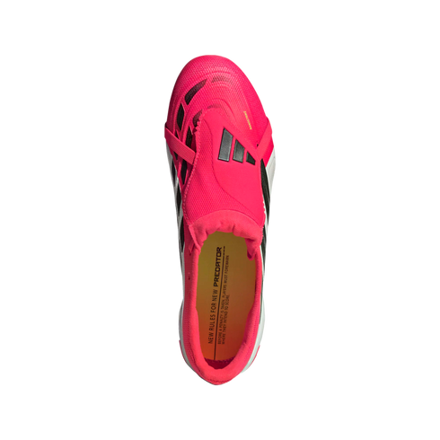 Top-down view of a bright pink Adidas Predator soccer cleat with a fold-over tongue and black accents, set against a black background.
