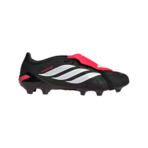 Profile view of an Adidas Predator soccer cleat in black, white, and red. Features a red fold-over tongue and three white diagonal stripes.