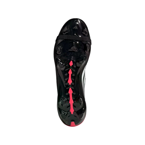 Bottom view of a glossy black Adidas soccer boot featuring pink arrow-shaped studs and a midfoot strap on a black background.