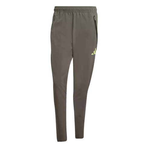 Olive-brown tapered Adidas athletic pants with an elastic waist and a pale yellow logo on the left thigh, centered on a black background.
