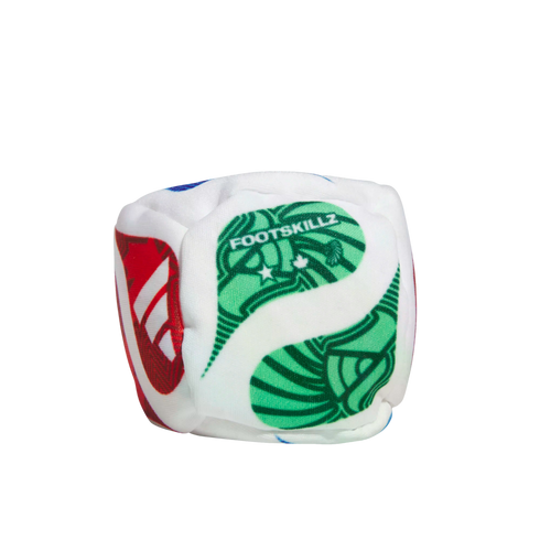 A soft white fabric cube with a green "FOOTSKILLZ" logo and red side pattern, isolated on a black background.