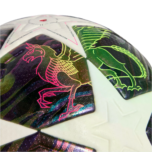 Close-up of a soccer ball with white star panels and iridescent dark panels featuring vibrant neon griffin outlines and a textured star pattern.