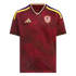 A maroon Adidas Venezuela national soccer jersey featuring a repeating geometric pattern, yellow and blue shoulder stripes, and the team crest on the chest.