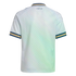 Back view of a white jersey with a geometric pattern, blue and gold trim on the collar and sleeves, and "italia" written in script below the neckline.