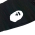 A white BAPE Ape Head logo printed on black fabric.