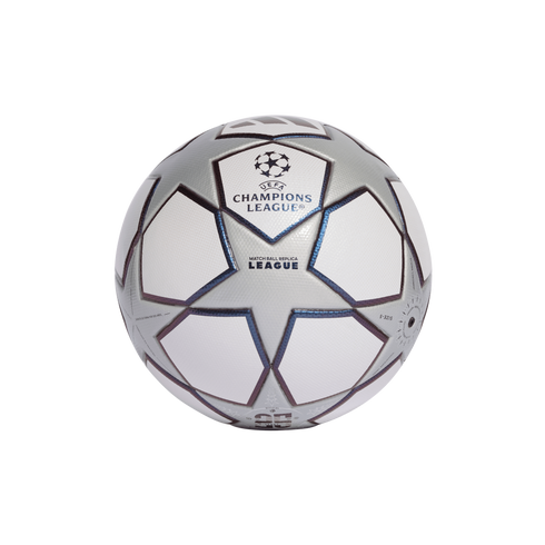White and silver UEFA Champions League replica soccer ball with blue star panels on a black background.