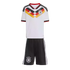 A kids' Germany home football kit with a white jersey featuring a black, red, and yellow chevron pattern and team crest, and black shorts with white side stripes.