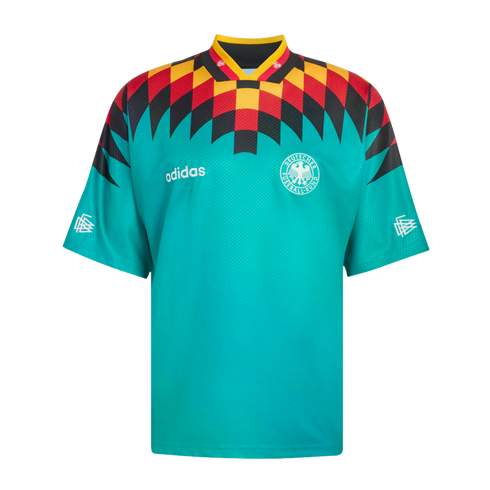Teal Adidas Germany soccer jersey with a red, yellow, and black geometric diamond pattern across the chest and shoulders, featuring the national team crest and white Adidas logo.