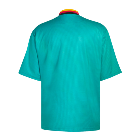 Back view of a teal short-sleeved jersey featuring a polo collar with yellow, red, and black horizontal stripes.
