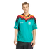 A man models a teal Adidas Germany soccer jersey with a bold black, red, and yellow geometric shoulder pattern, paired with black athletic shorts against a white background.