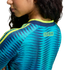 Back view of a person wearing a blue patterned sports jersey with lime green trim and the word "COLOMBIA" printed in yellow on the upper back.