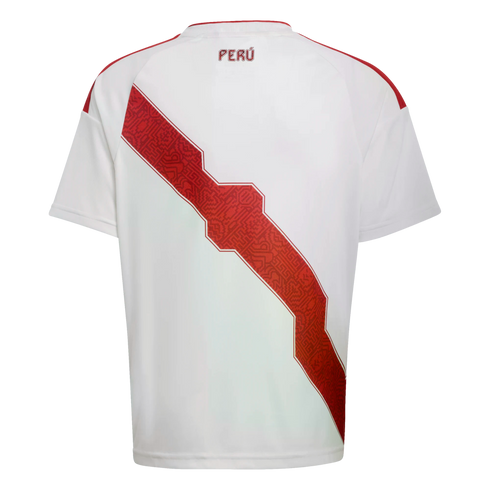 The back of a white Peru national team soccer jersey featuring a red diagonal sash with an intricate geometric pattern and the word "PERÚ" printed below the collar.