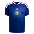 Blue Adidas Japan national soccer jersey featuring a light blue curved line pattern, white shoulder stripes, and the central JFA crest.
